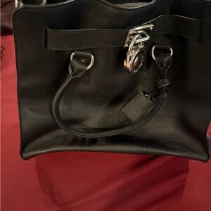 Stylish Black Handbag with Silver Accents